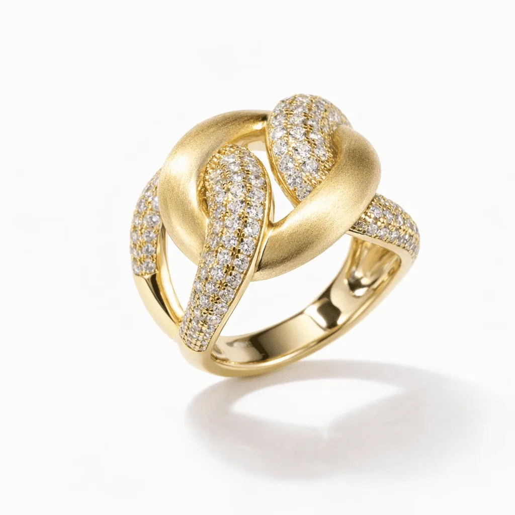 gold statement ring gold vermeil modern sculptural knot design with pavé-set clear stones and satin finish