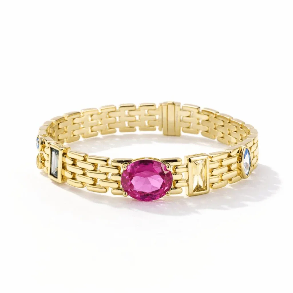 vermeil bracelet in gold vermeil with oval pink centerpiece, baguette accents, and polished link chain design