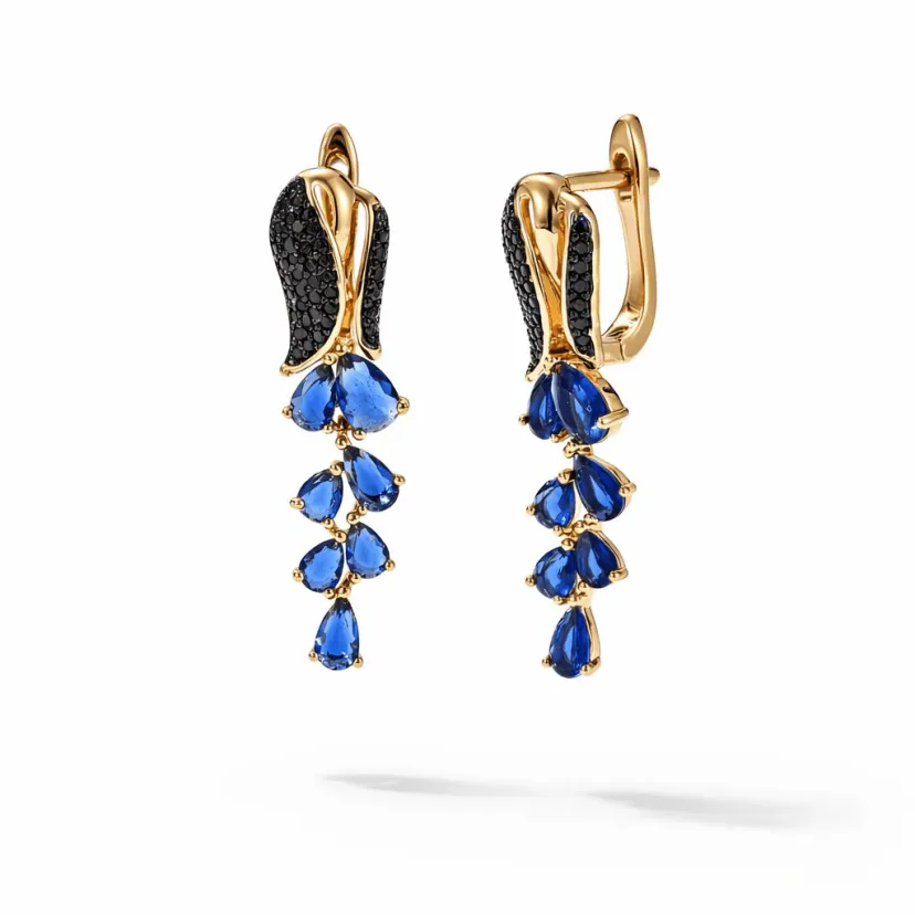 Sapphire drop earrings in gold vermeil, modern sculptural leverback design with black pavé and cascading blue stones