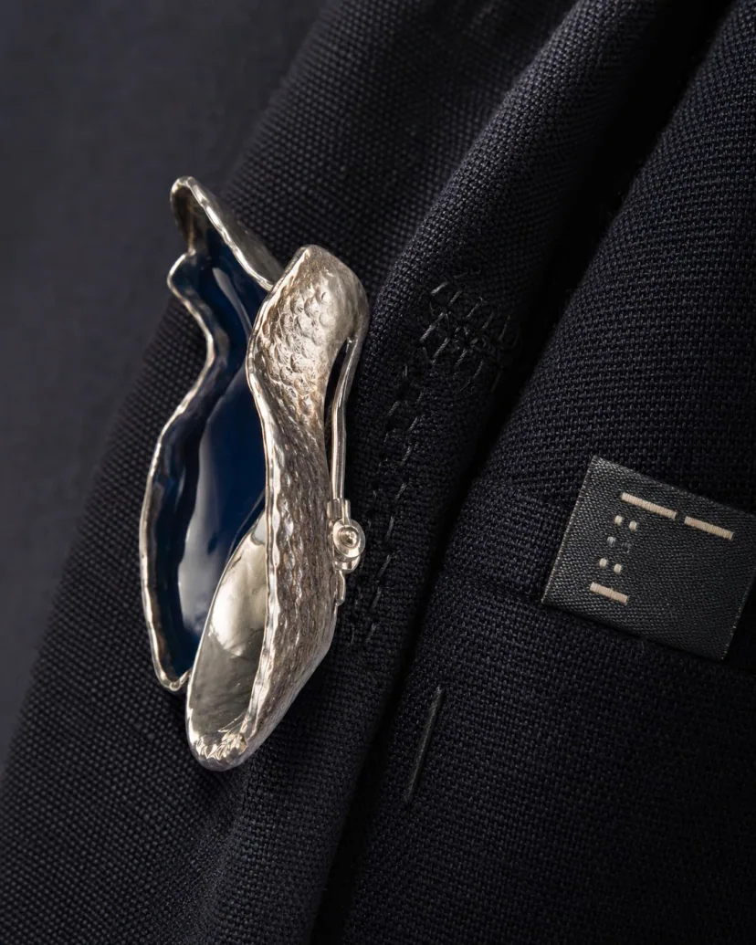 symbol failure merchandise — close-up of “Made in” label and quality stitching