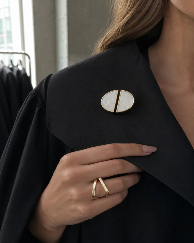 graduation nails in pearl gray with a brushed silver brooch for ceremony styling