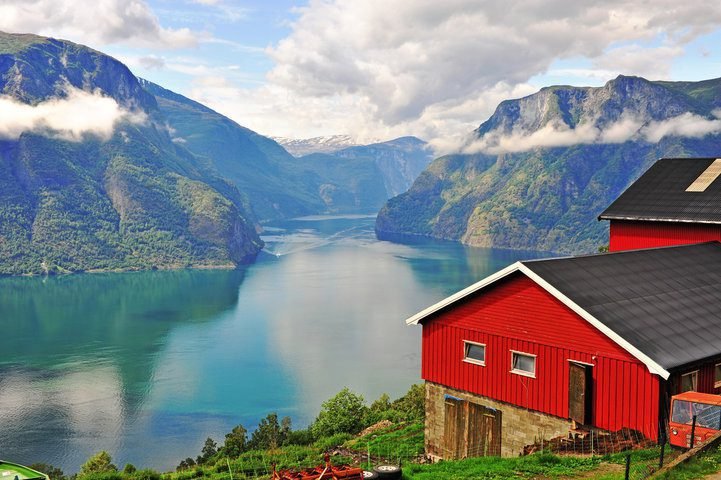 ed cabin overlooking a dramatic fjord, showing how a change of place can completely shift your perspective.