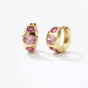 Gold hoop earrings with pink gems in 18k gold vermeil, modern sculptural huggie hoops with bezel-set pink stones