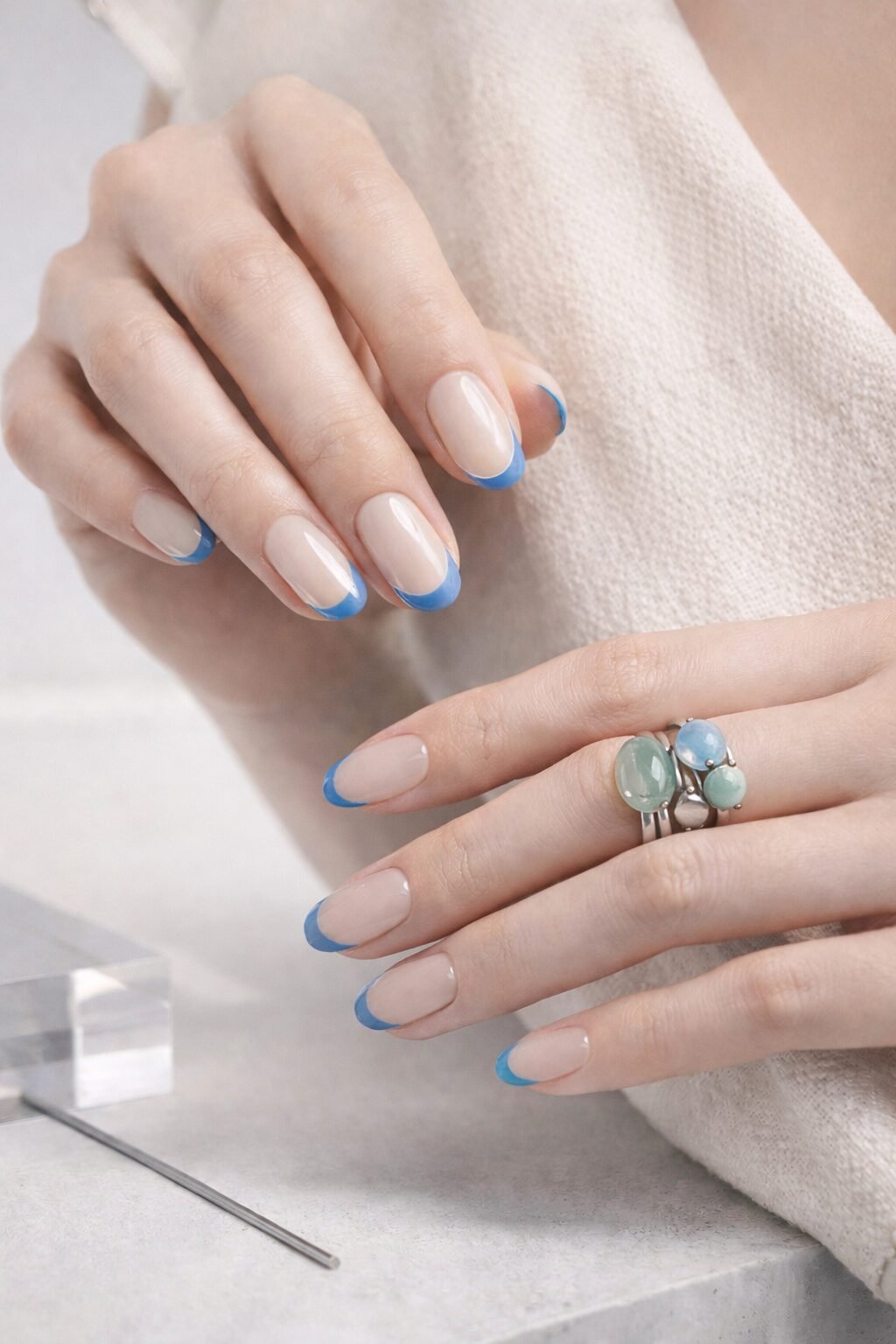 2026 spring color trends nails and accessories: Cool Blue micro-French tips with Jade and Plum Noir modular charms